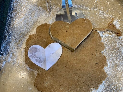 Preparing heart shaped treats for the animals